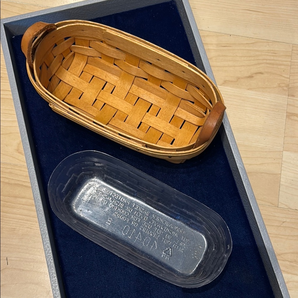 Longaberger woven butter basket. Weaver, date and number shown.